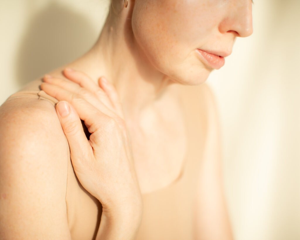 Luxury skincare close-up with soft feminine gesture