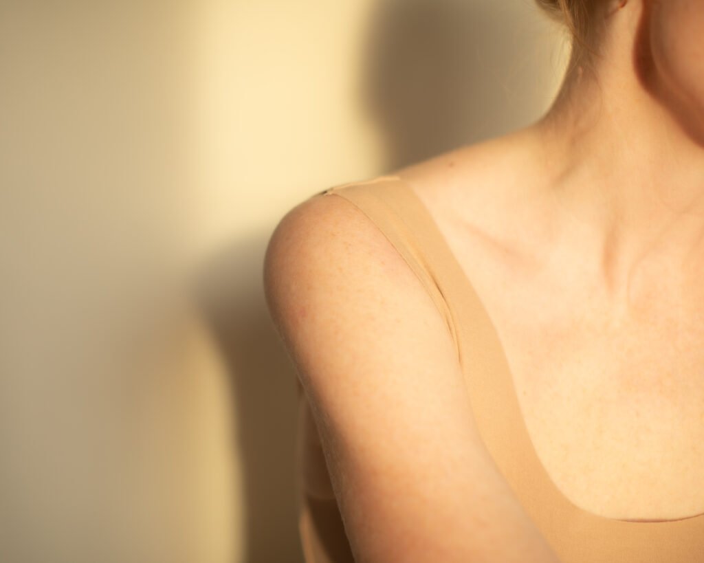 Quiet luxury skincare portrait with warm evening sunlight