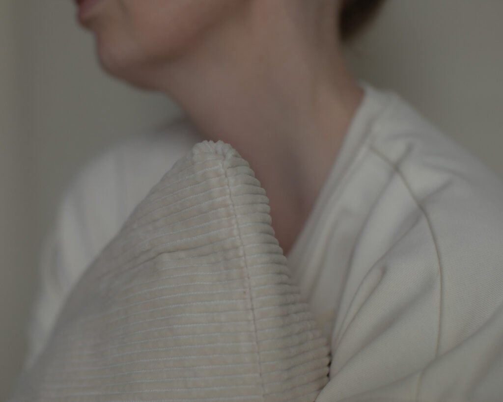 Soft profile portrait expressing calm and stillness.